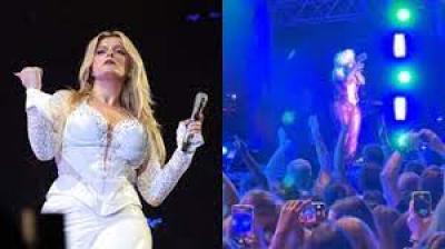  Bebe Rexha é atingida no rosto por celular arremessado durante show
